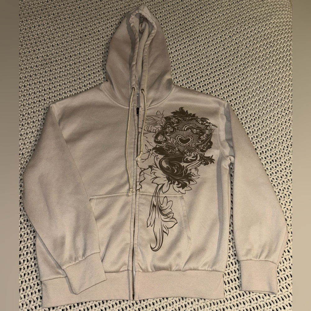 tan and brown zip up jacket w/ design